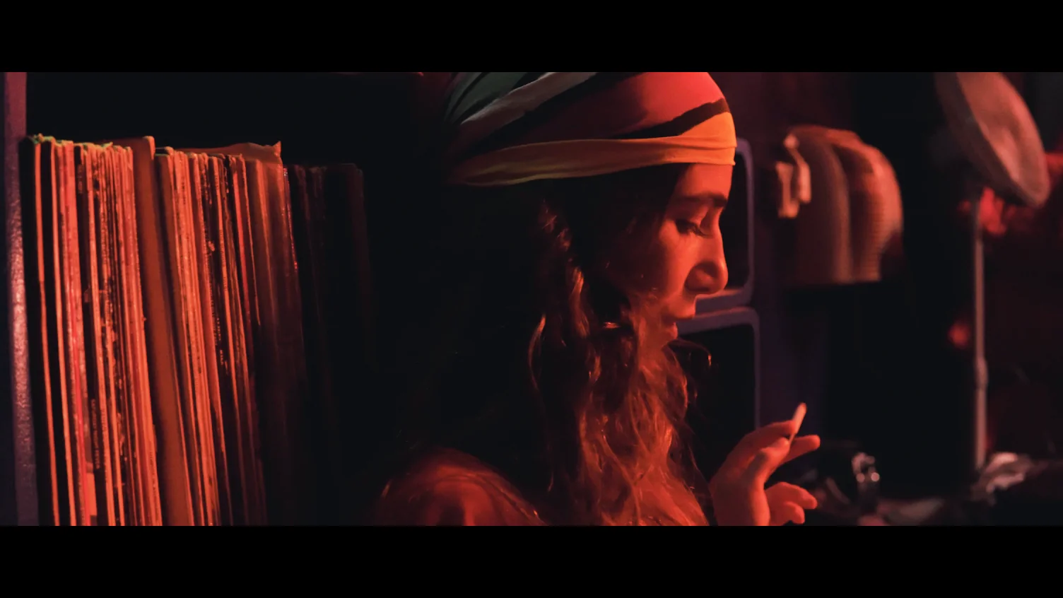 Red-lit music performance in Time Warp — Lucky 420.